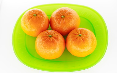 Healthy food series with tangerines on light background
