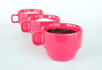Three cups with coffee sugar and milk