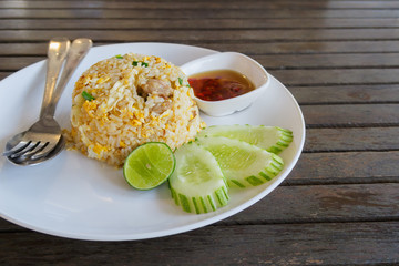 side view fried rice on black background