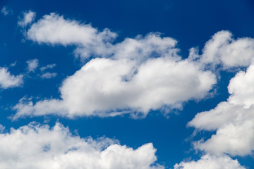 Beautiful clouds against blue sky as background