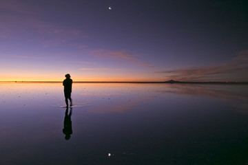 Gradient colour reflection and moon at Uyuni Bolivia