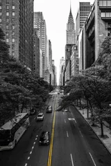 Photo sur Plexiglas TAXI de new york Rues sans fin de Manhattan New York gratte-ciel voitures jaune marquage noir et blanc