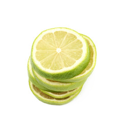 Pile of multiple lime slices isolated