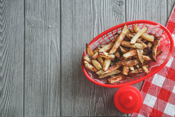 Summer cooking tabletop with homemade hamburgers and frenchfries
