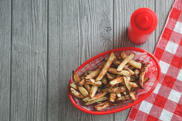 Summer cooking tabletop with homemade hamburgers and frenchfries