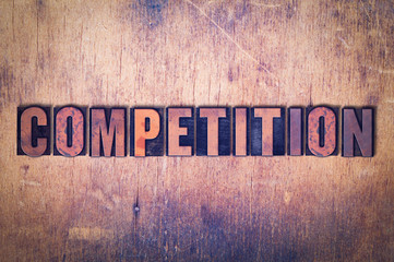 Competition Theme Letterpress Word on Wood Background