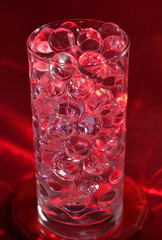 Silicone balls on a red background