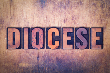 Diocese Theme Letterpress Word on Wood Background