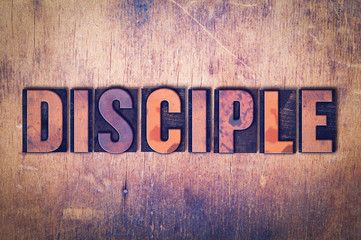 Disciple Theme Letterpress Word on Wood Background