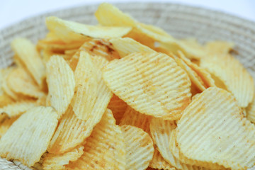 Potato fries or  French fries in a basket  isolated on white background.