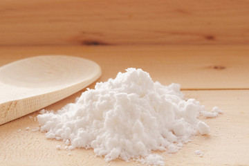 Bicarbonate on table with cup