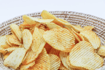Potato fries or  French fries in a basket  isolated on white background.