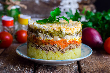 Layered salad with liver and vegetables