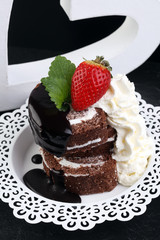 Chocolate yule log christmas cake. Valentine day cake with straw
