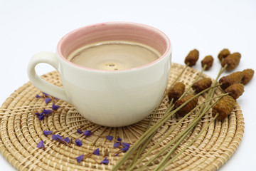 Relax with a good cup of coffee on white background .A feel good time of life.