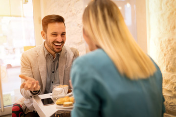 Businesspeople In A Cafe