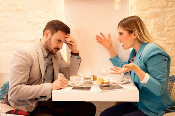 Businesspeople In A Cafe