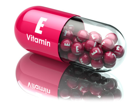 Vitamin E capsule or pill. Dietary supplements.
