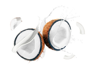 Coconut cut in half isolated on white background