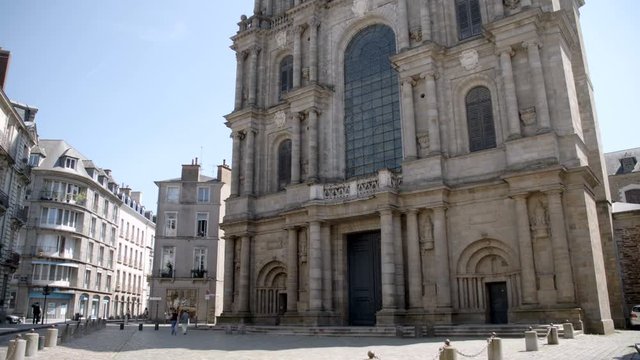 People walking in front of Rennes Cathedral 