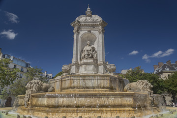 Fototapeta na wymiar The Fontaine des Orateurs-Sacré in place Saint-Sulpice