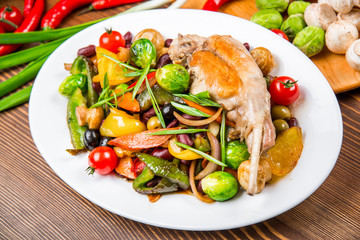 Dish with rabbit meat with vegetables