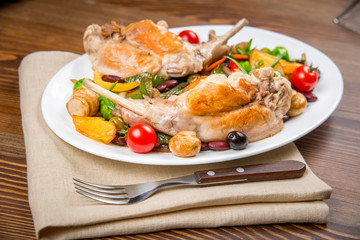 Dish with rabbit meat with vegetables