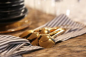 Set of cutlery on table in restaurant, closeup