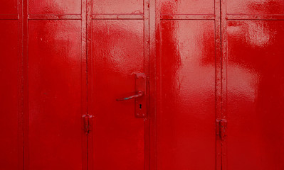 Red metal sheet door with handle