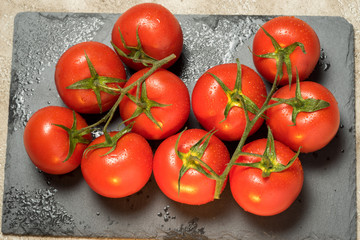 bunch of red ripe wet tomatoes