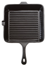 Cast iron skillet grill pan. Top view. Oiled. Isolated on white.