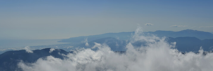 Clouds, mountains and coast
