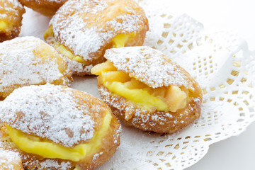 Handmade krapfen filled with pastry cream