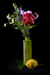 A bouquet of flowers on a black background