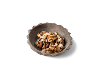 Small saucer with walnuts ready to eat