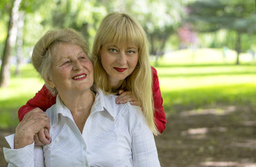 Mother and daughter in the park