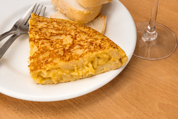 Spanish tortilla with wine, tapas in a bar