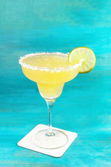 Margarita cocktail photo on vibrant background with copyspace