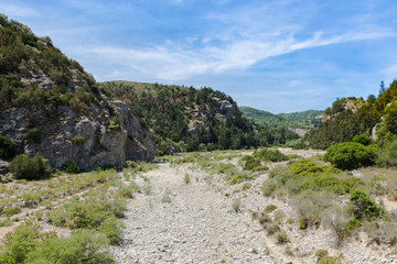 Fototapeta na wymiar Dry riverbed of the Gadoura river at Rhodes island. Greece. Europe.