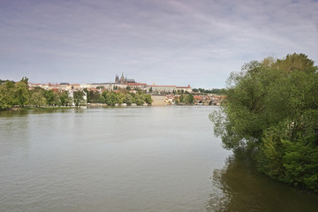 Obraz premium View from the Czechoslovak legion bridge over the river Vltava to the Hradcany in Prague