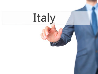 NAME - Businessman hand pressing button on touch screen interface.