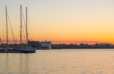 Palma de Mallorca Cathedral from the coast wake up, dawn of a new day, reflected in water. Balearic islands of Spain