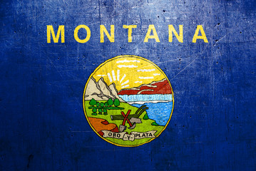 Flag of Montana, USA, with an old, vintage metal texture