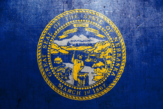 Flag of Nebraska, USA, with an old, vintage metal texture