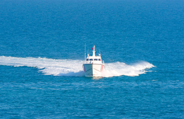 Coast Guard patrol boat rushing to the rescue