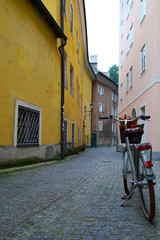Travel to Salzburg, Austria. A bicycle on the narrow street in the city center.