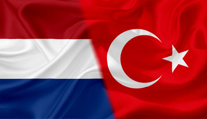 Flag of Netherlands and Turkey, with waving fabric texture