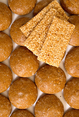 Biscuits and sweet bars with honey and sesame seeds. Top view