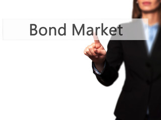 Bond Market -  Young girl working with virtual screen an touching button.