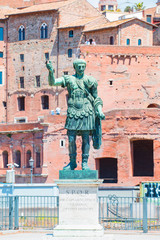 Naklejka premium Statue S.P.Q.R. IMP. CAESARI NERVAE Augustus on street Via dei Fori Imperiali, Rome, Italy